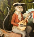 mono tocando la guitarra